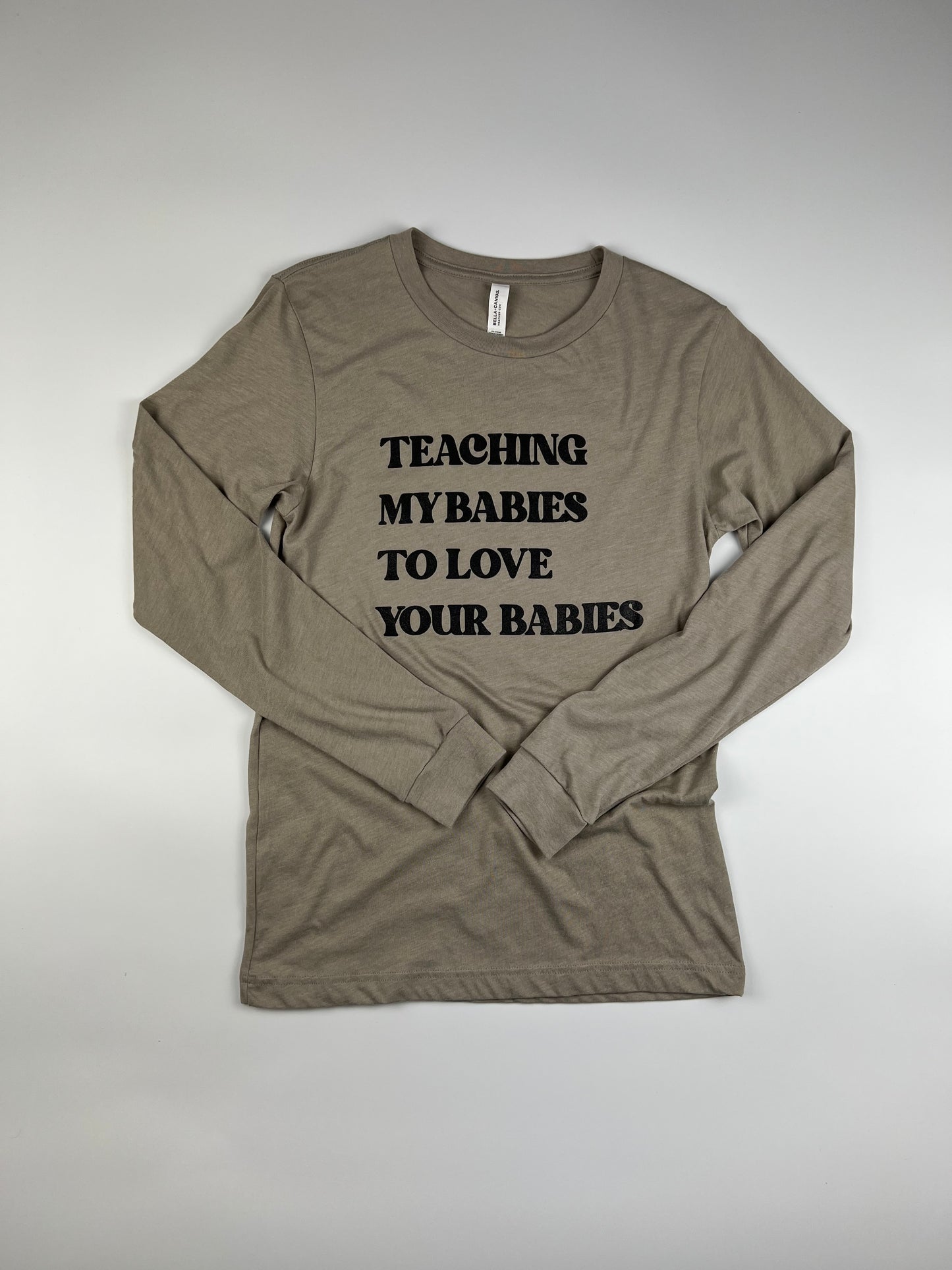 TEACHING MY BABIES TO LOVE YOUR BABIES LONG SLEEVE